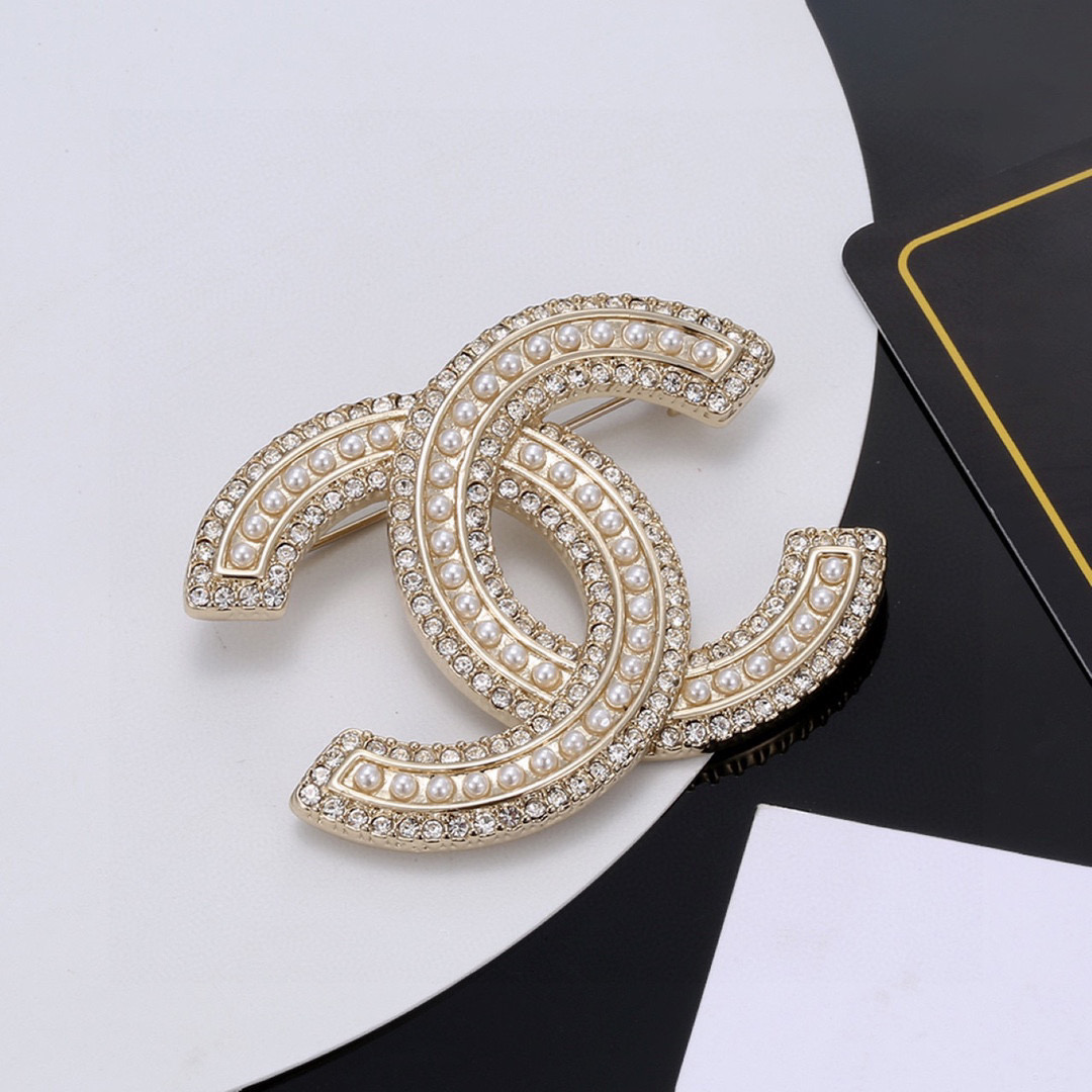 Chanel brooch full of diamonds