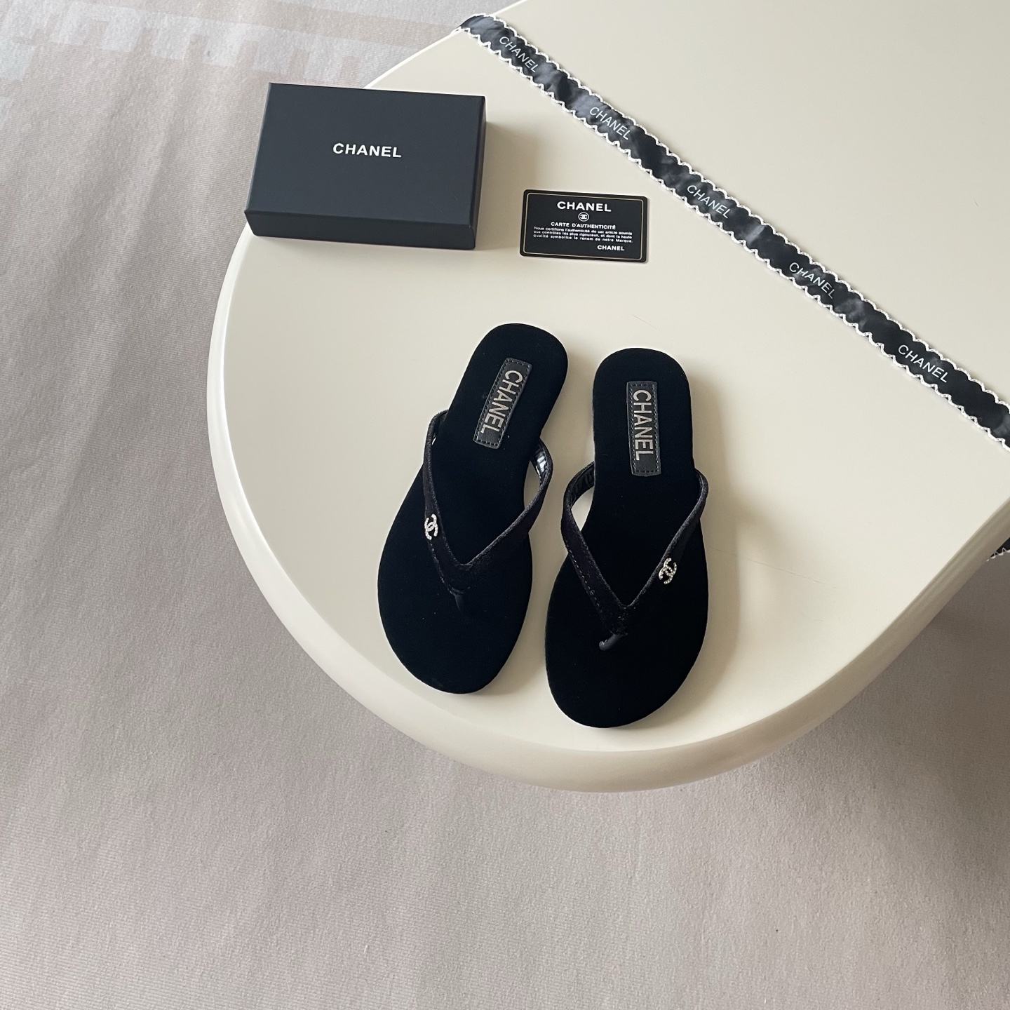 Chanel Embellished Logo Flip-Flops - Black