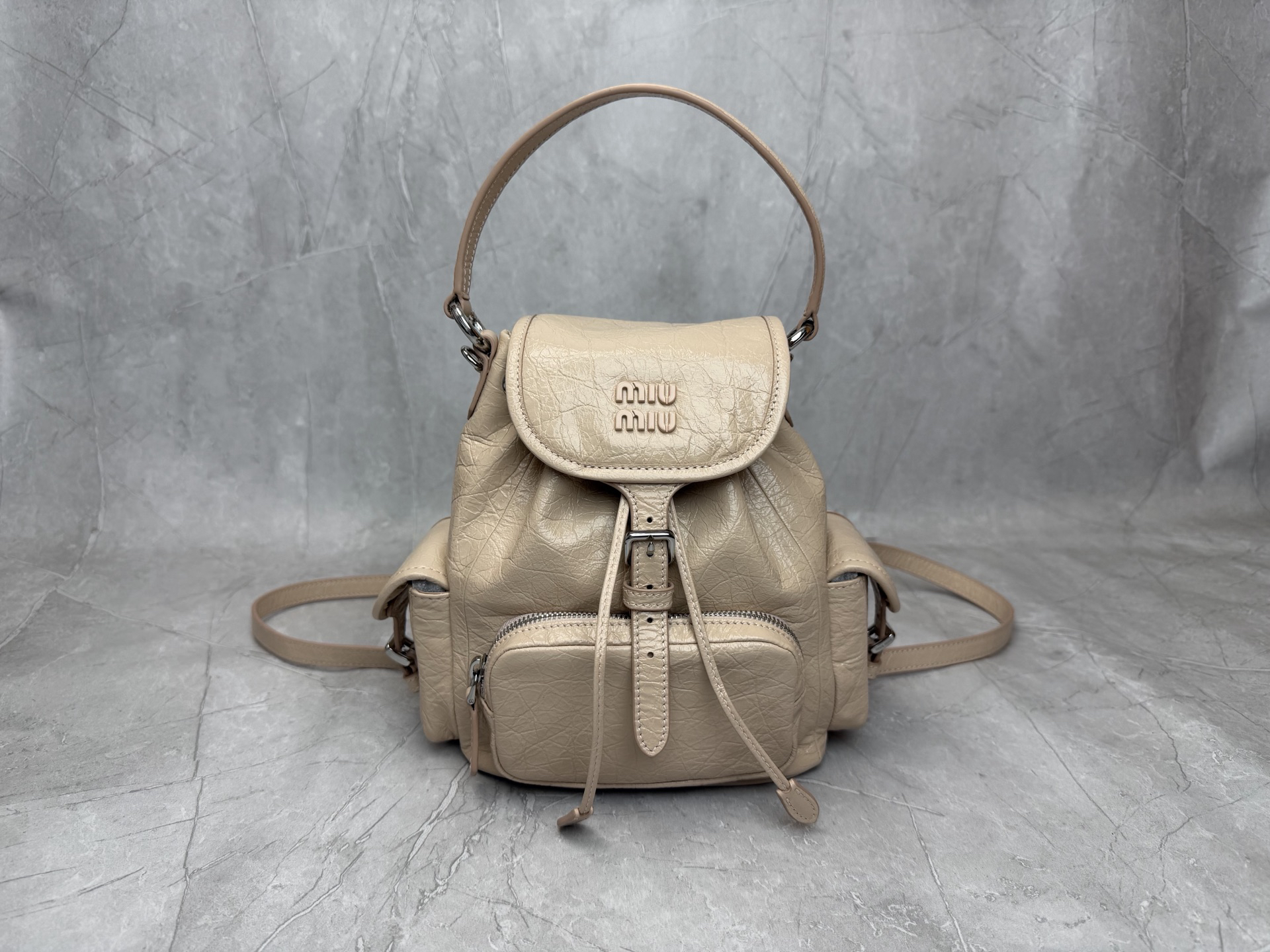 Miu Miu Aventure Cracked Vintage Nappa Leather Drawstring Backpack