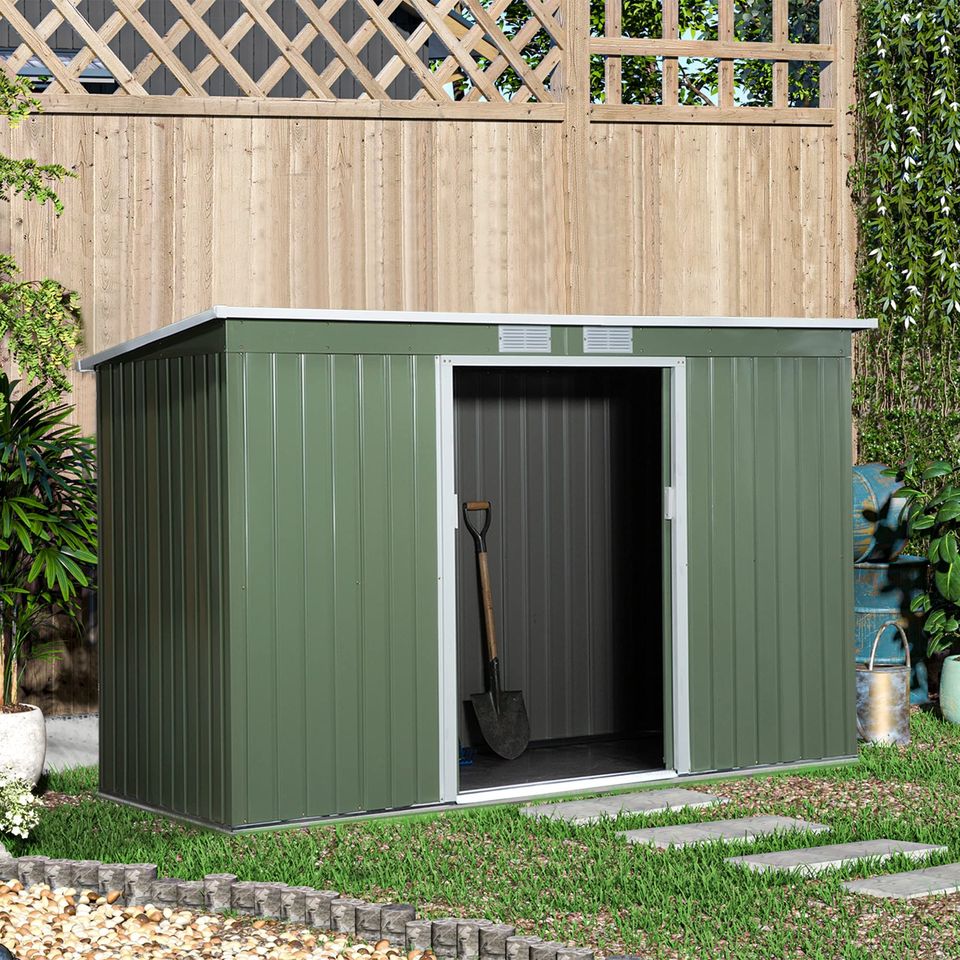 Corrugated metal storage shed outside equipment kit, light green