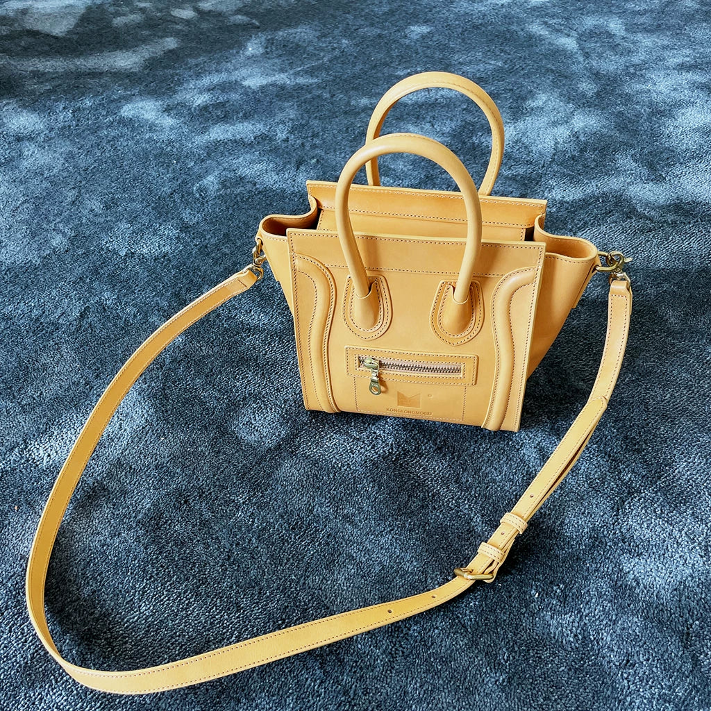 Cowhide zipper crossbody bag