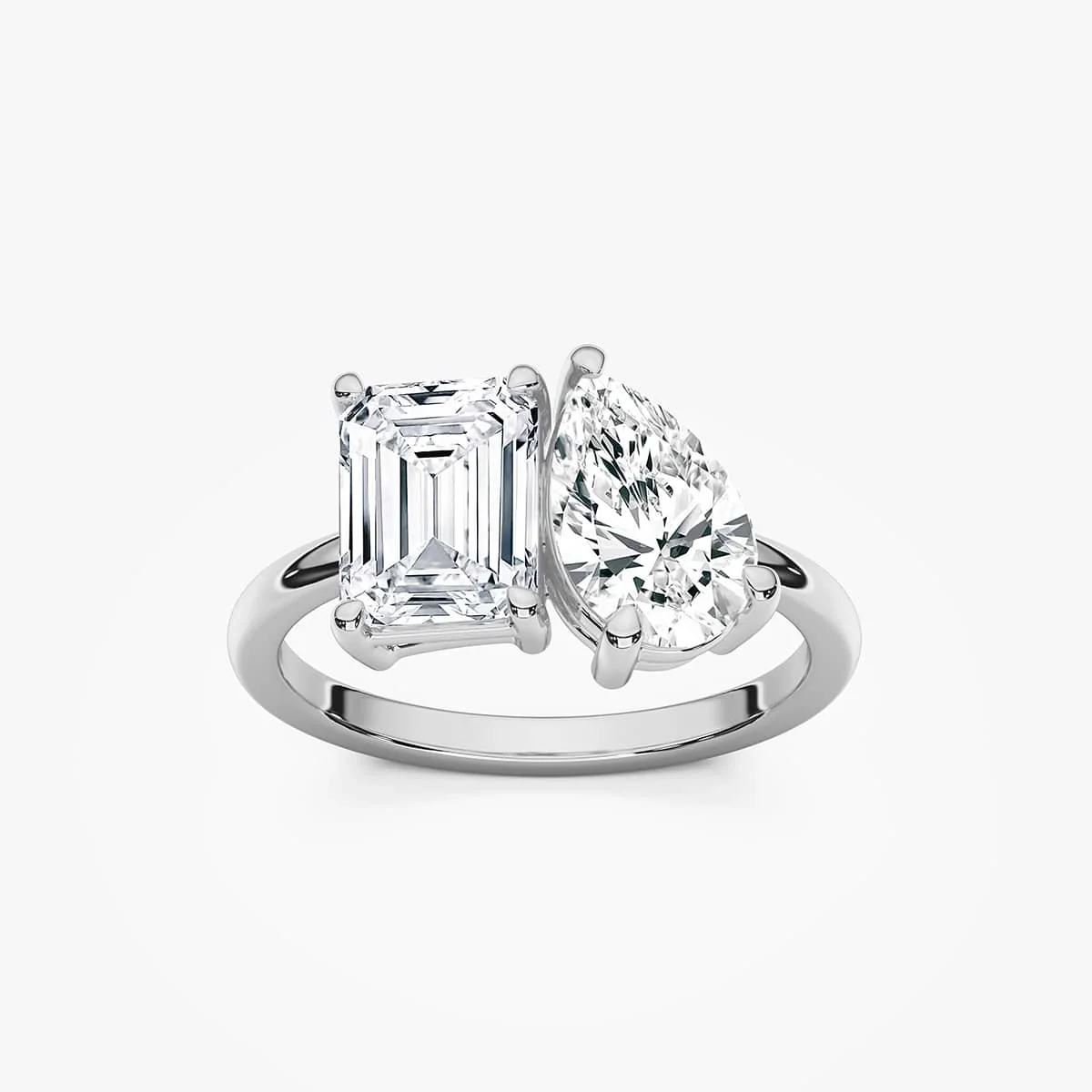 Fleur 2 ½ ctw Emerald and Pear Lab Grown Diamond Toi et Moi Engagement Ring