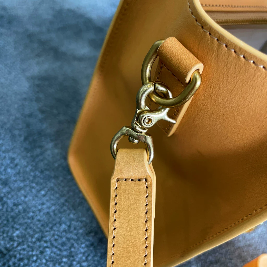 Cowhide zipper crossbody bag