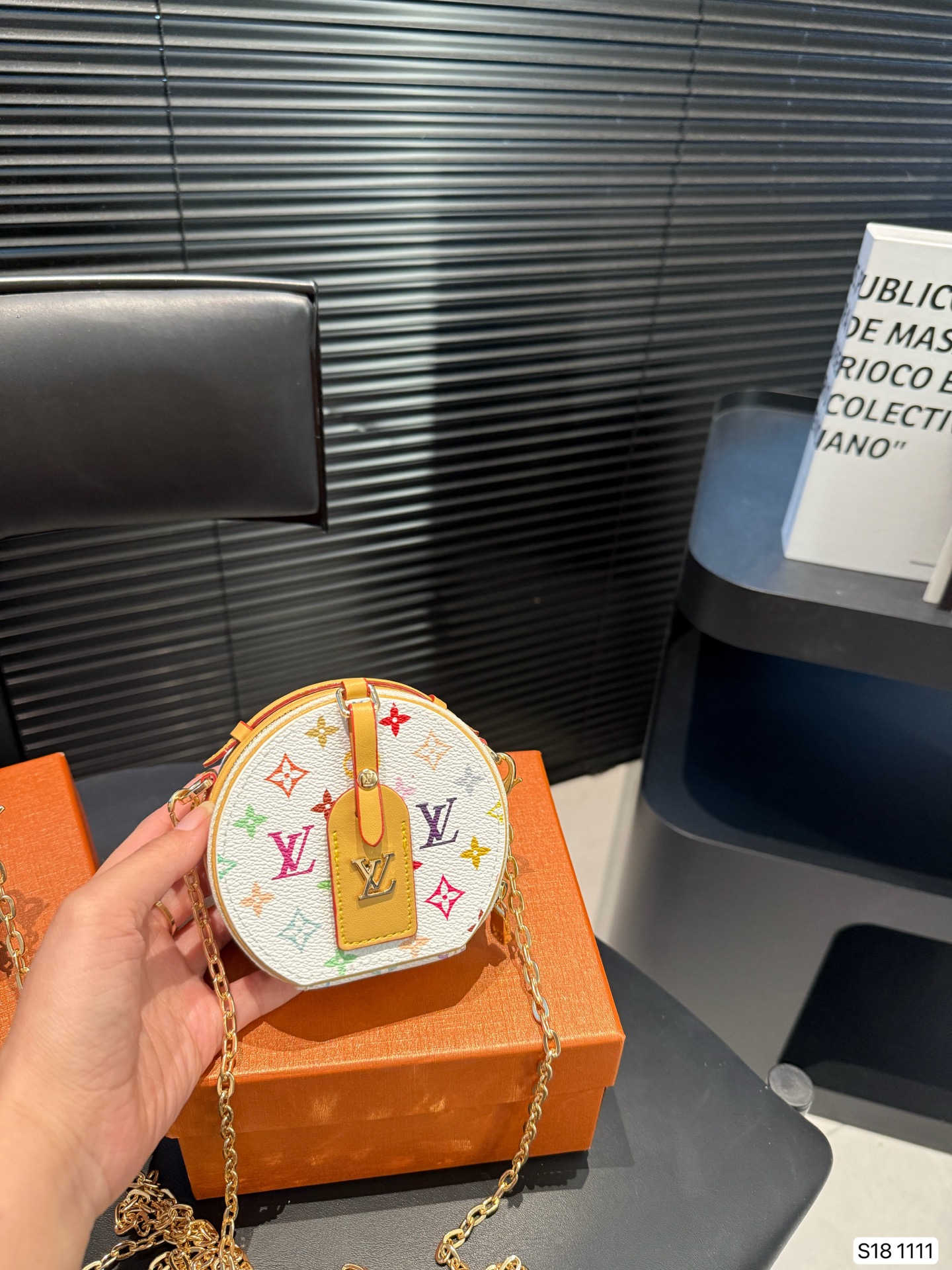 LV round pancake coin purse