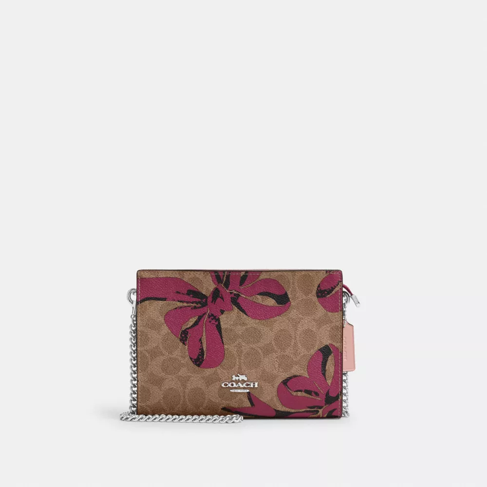 Slim Crossbody Bag In Signature Canvas With Bow Print