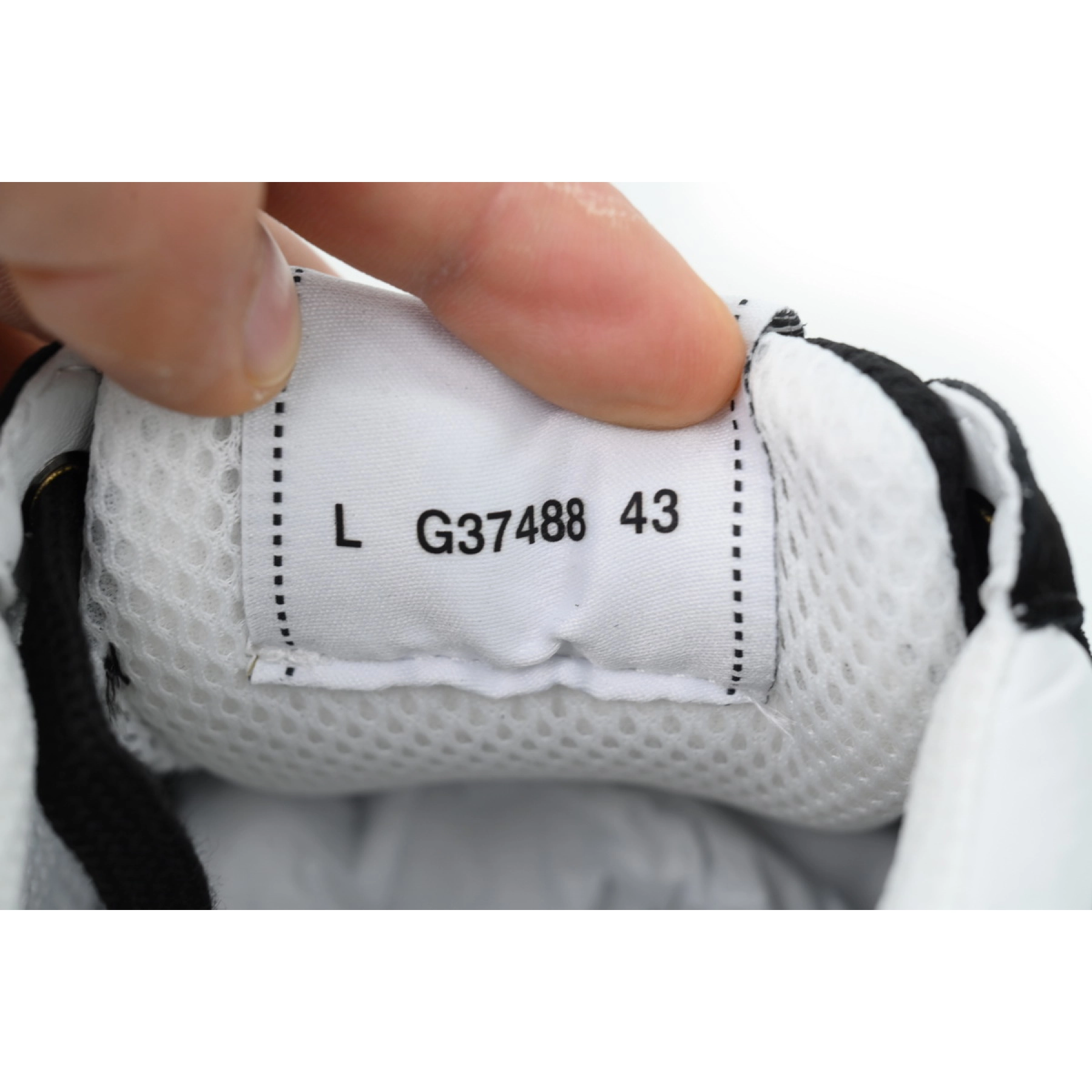 Chanel Low Top Trainer Black White