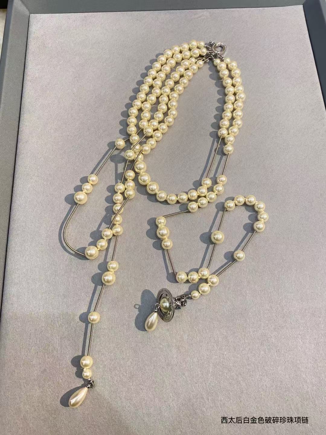Vivienne Westwood asymmetrical three-dimensional pearl pendant necklace