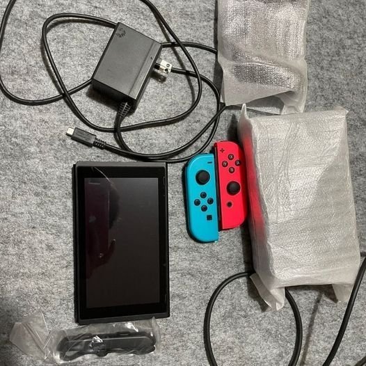 Nintendo Switch with Neon Blue and Neon Red Joy Con –