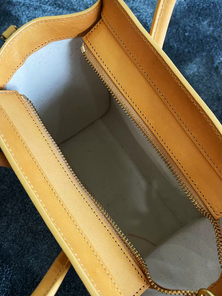 Cowhide zipper crossbody bag
