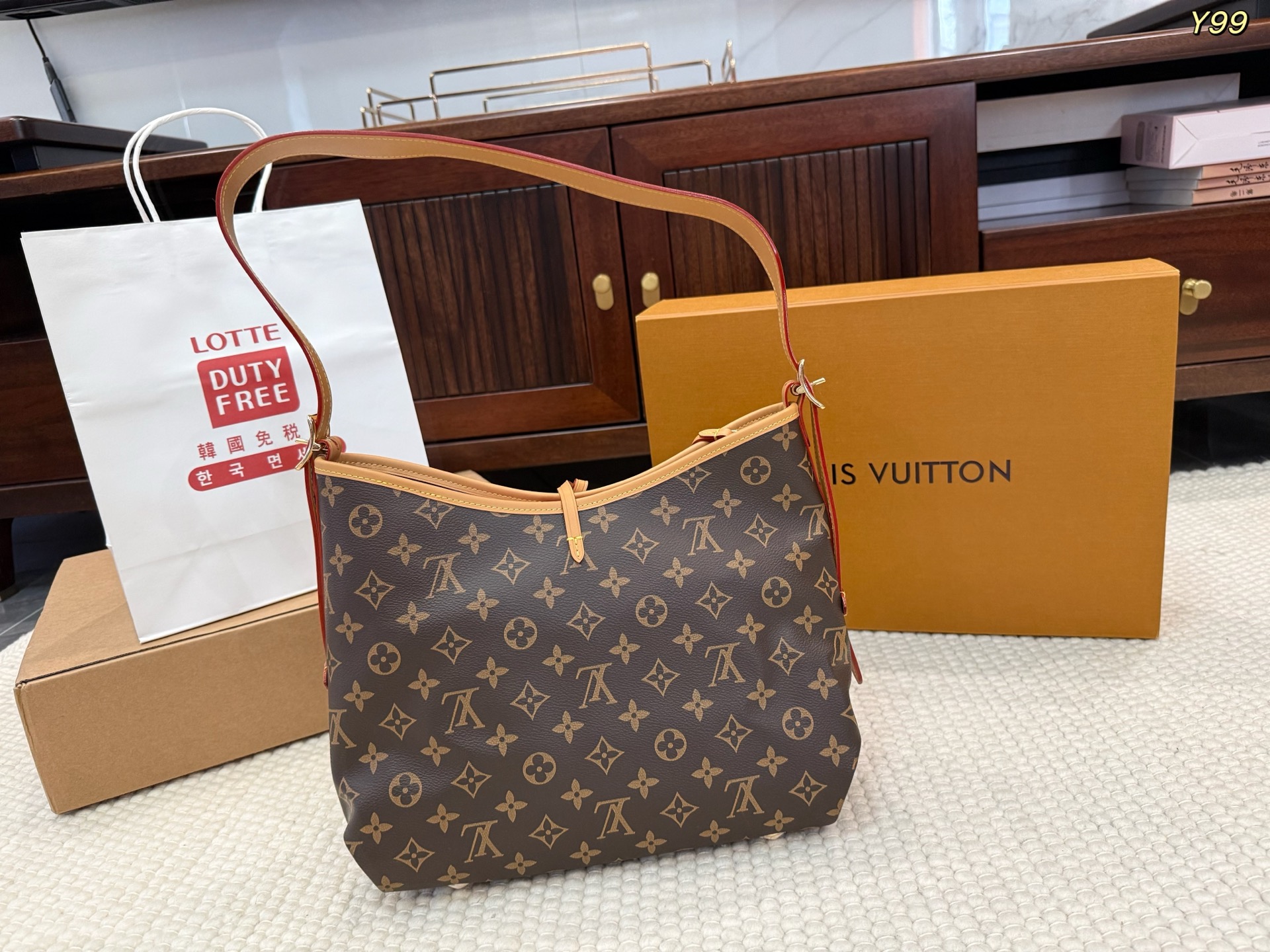 LV CarryAll PM Monogram Handbag