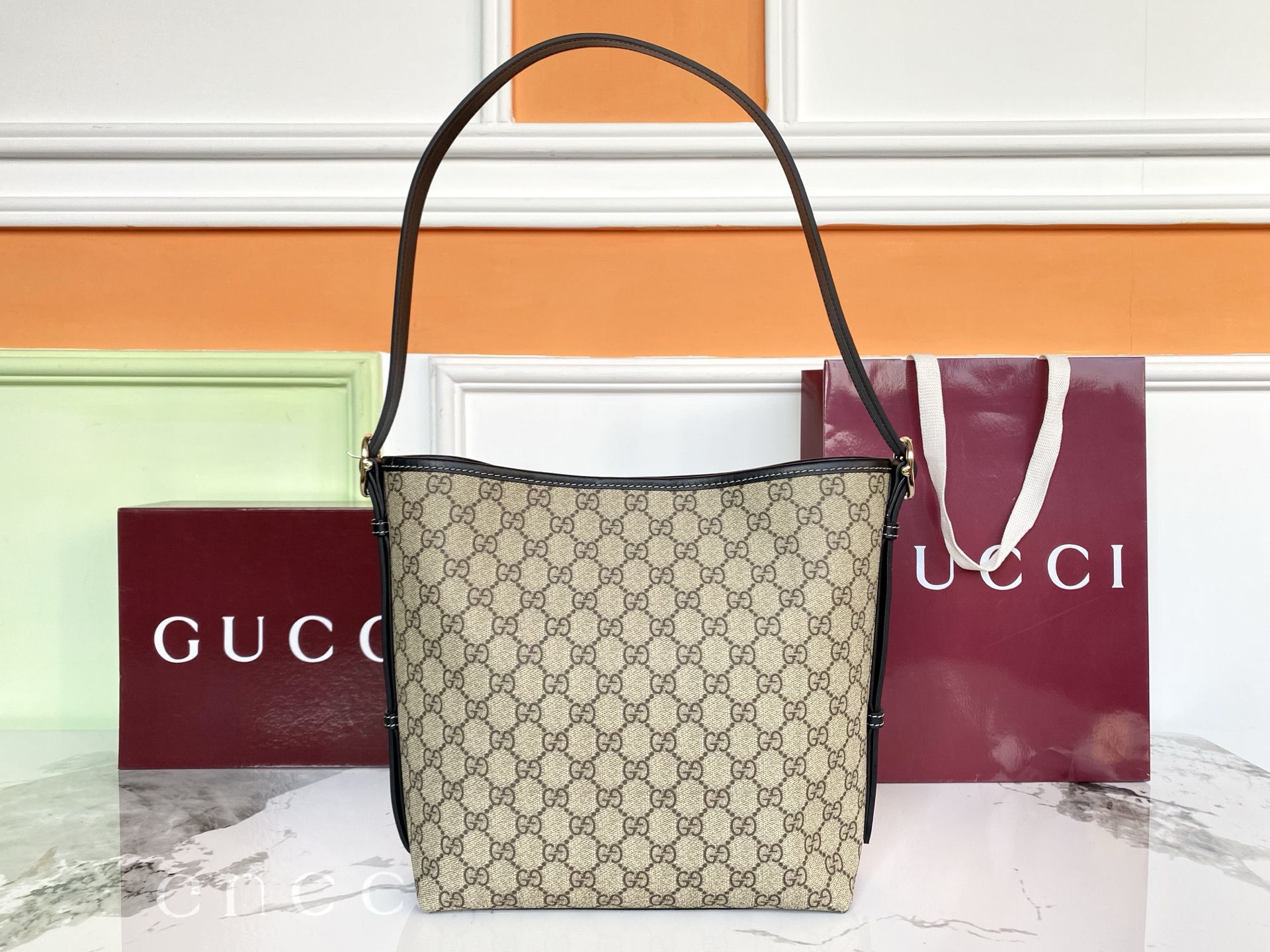 GUCCI GG Emblem Medium Bucket Bag