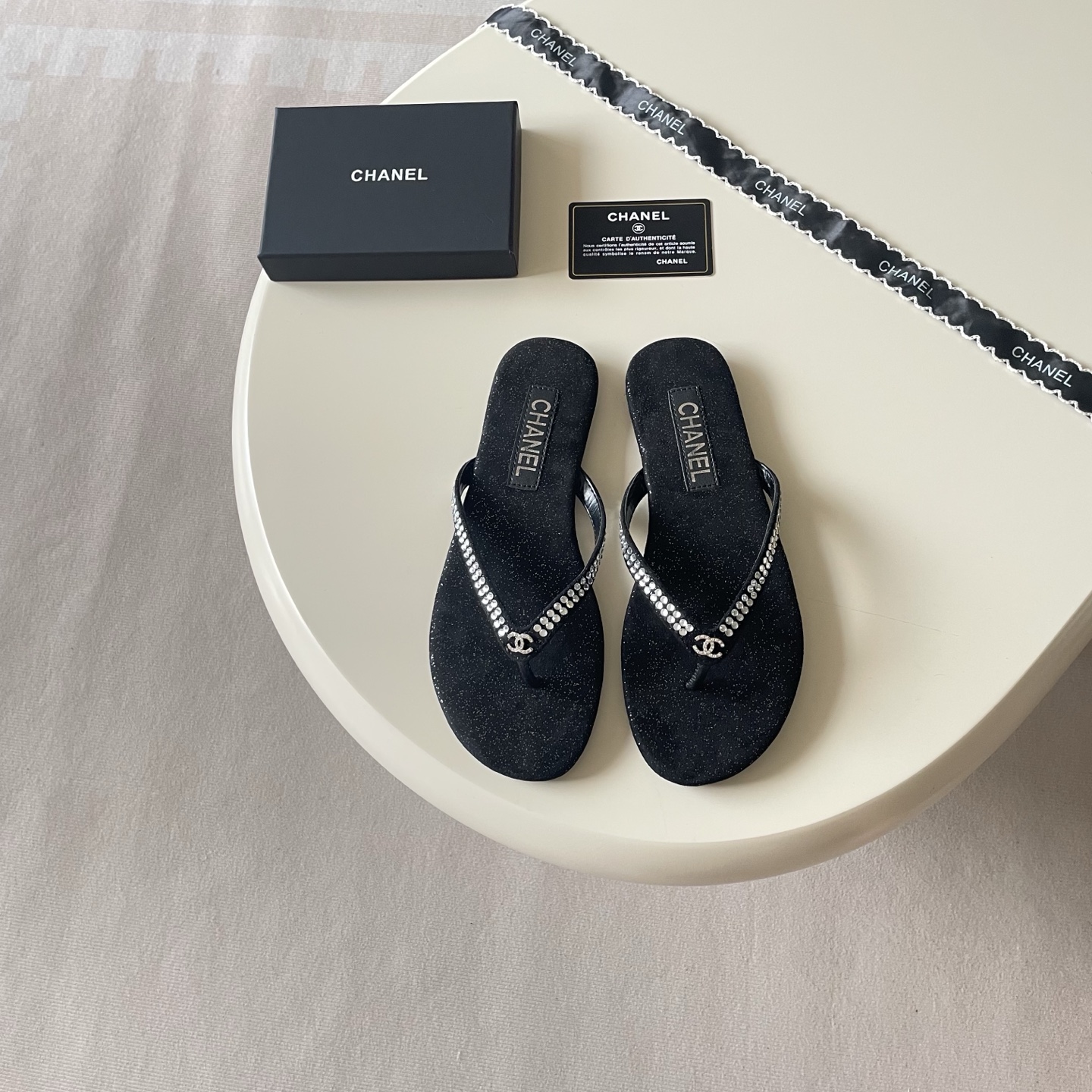 Chanel Embellished Logo Flip-Flops - Black