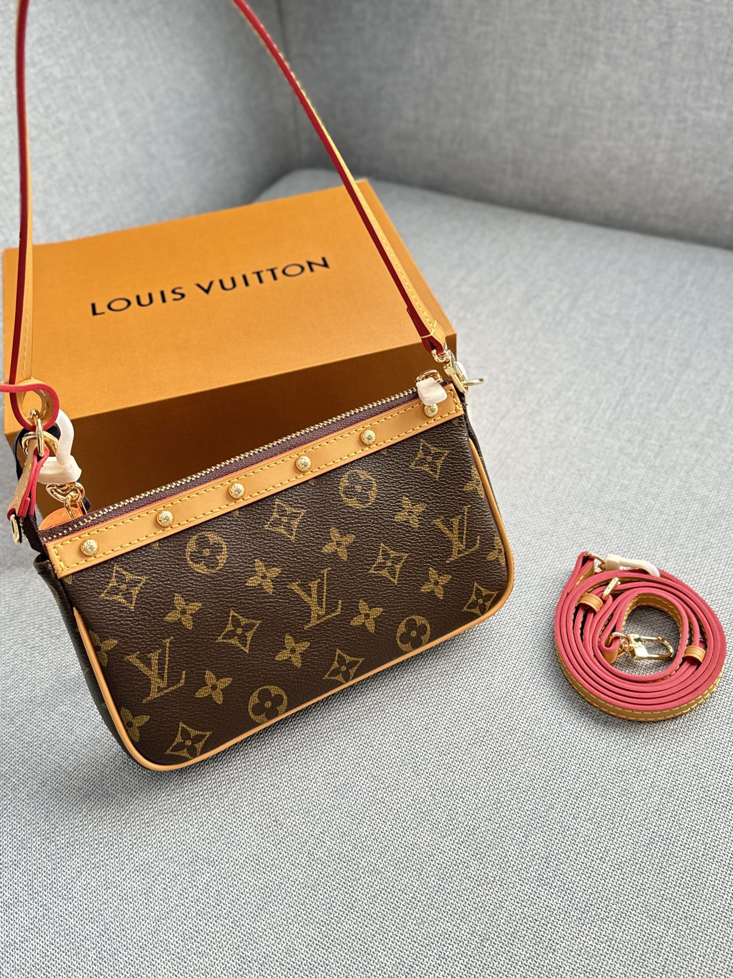 LV studded vintage chain bag
