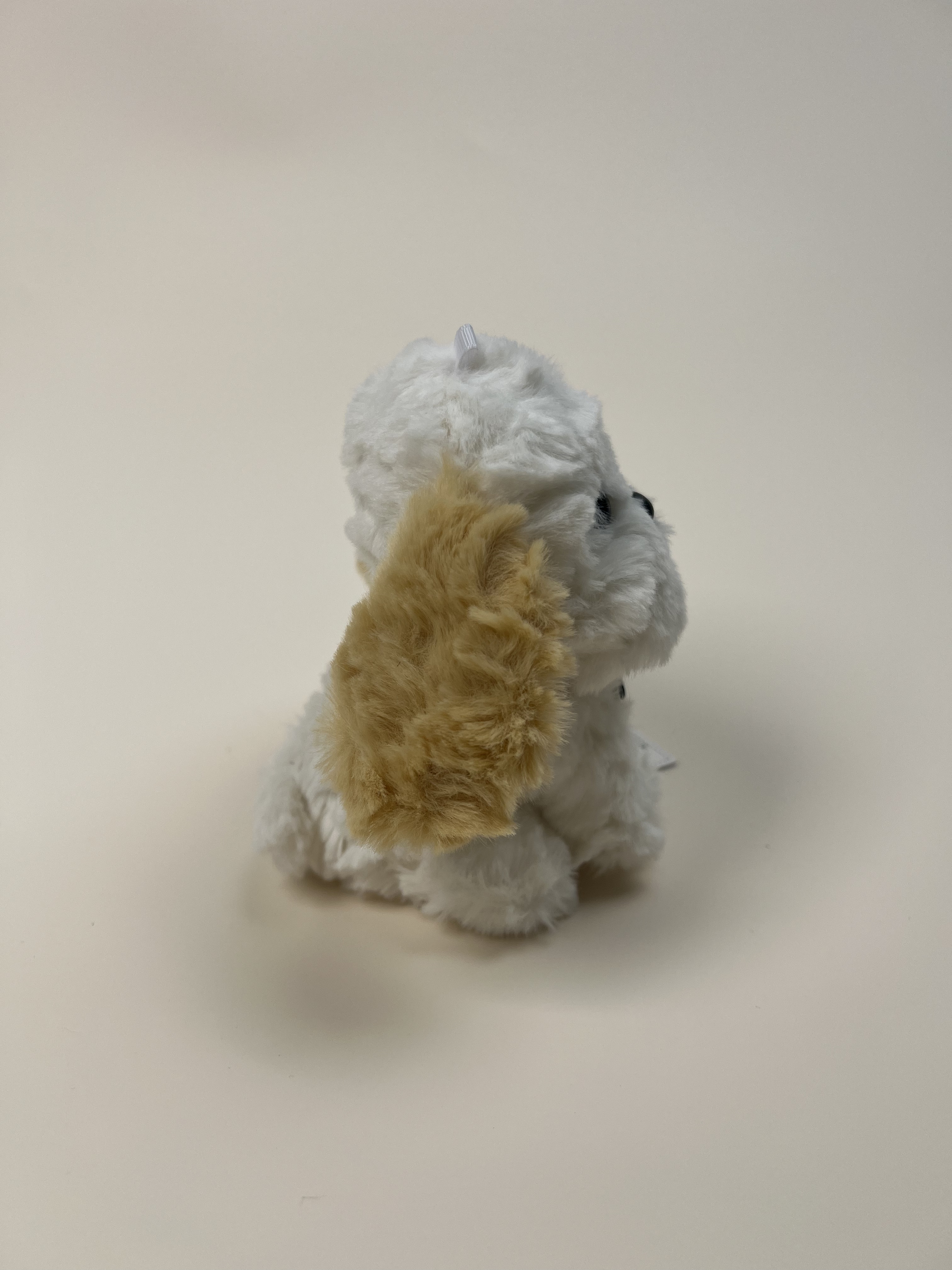 “Love” Tag Plush Toy: Tongue-Sticking-Out Curly-Haired Puppy
