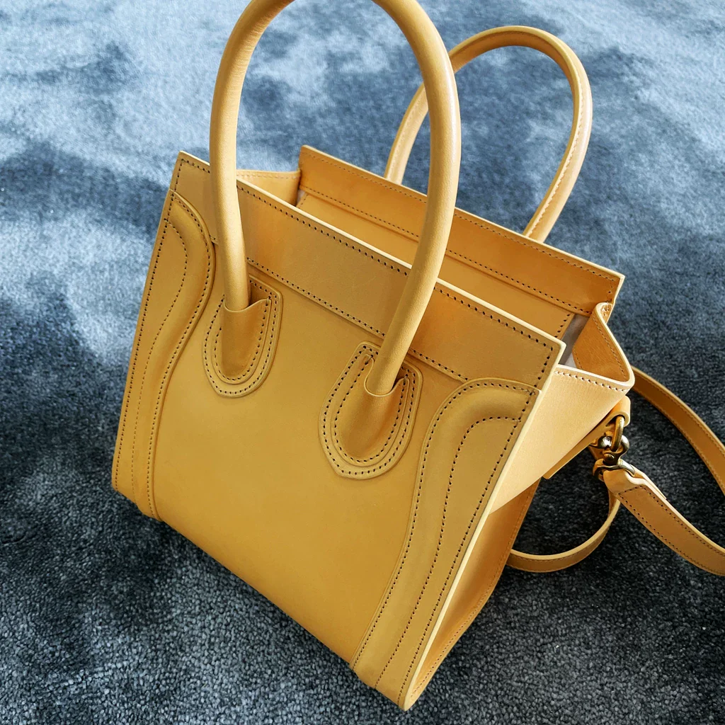 Cowhide zipper crossbody bag