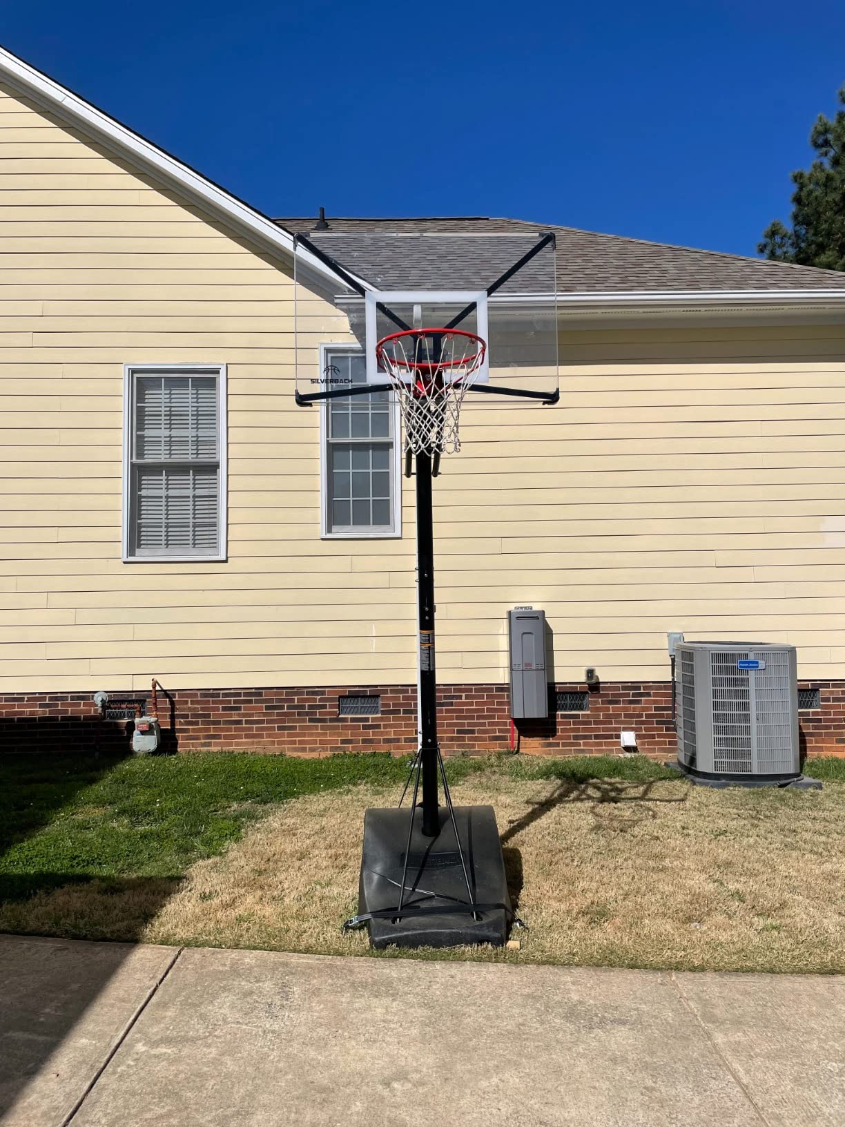 Portable Height-Adjustable Basketball Hoop - Easy Lift & Roll