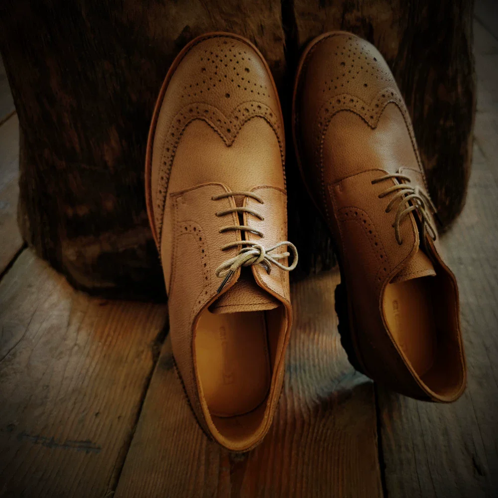 Camel leather brogue engraved casualtie back shoes