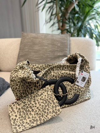CHANEL Drawstring Shopping Tote in Leopard Print Canvas