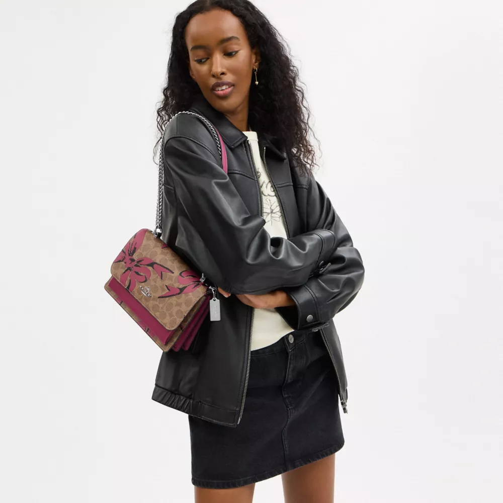 Klare Crossbody Bag In Signature Canvas With Bow Print