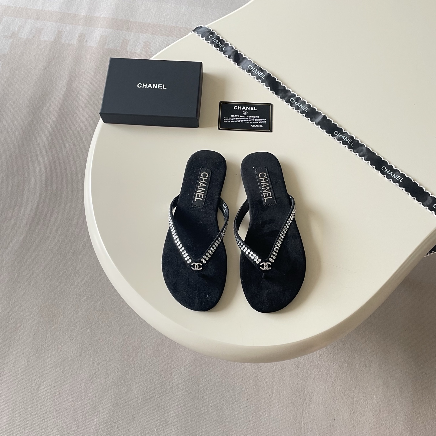 Chanel Embellished Logo Flip-Flops - Black