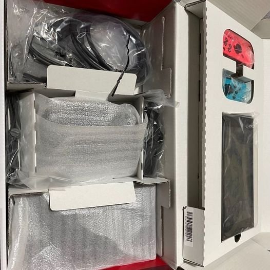 Nintendo Switch with Neon Blue and Neon Red Joy Con –