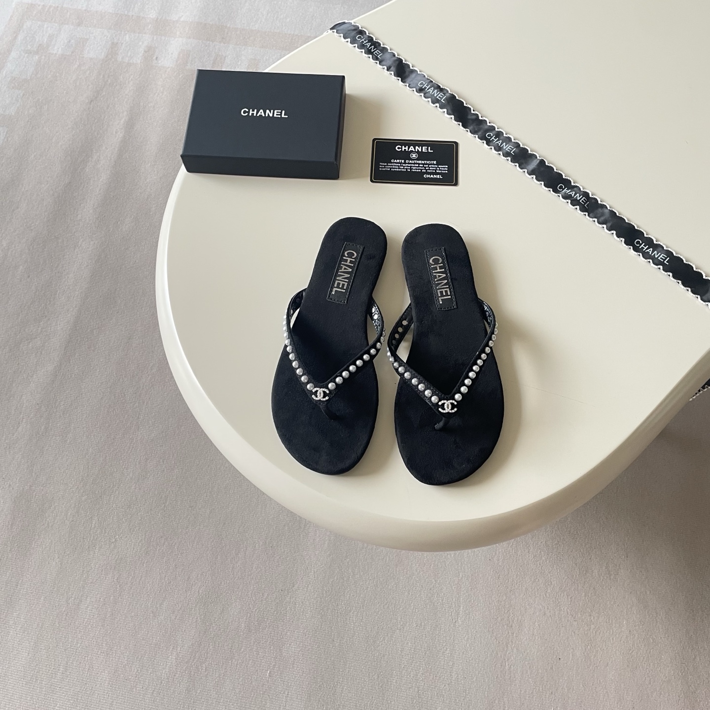 Chanel Embellished Logo Flip-Flops - Black