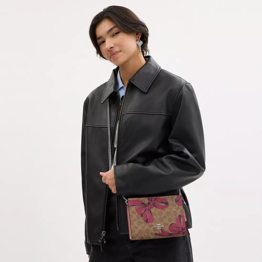 Slim Crossbody Bag In Signature Canvas With Bow Print