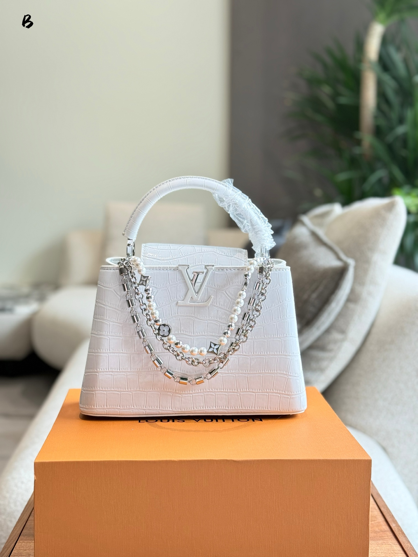 LV Capucines crocodile print handbag