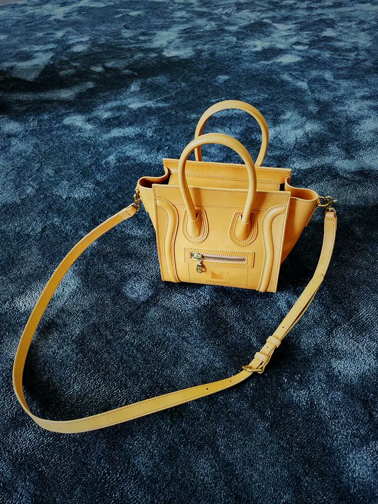 Cowhide zipper crossbody bag