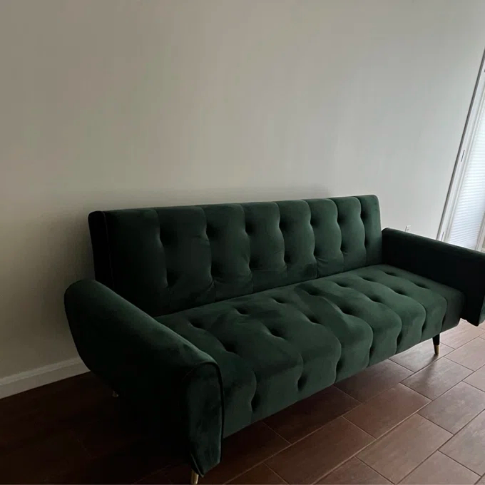 A sofa wrapped in flannel.