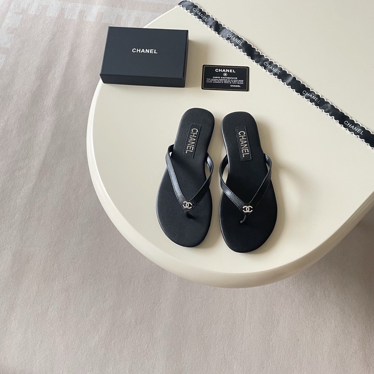 Chanel Embellished Logo Flip-Flops - Black & White