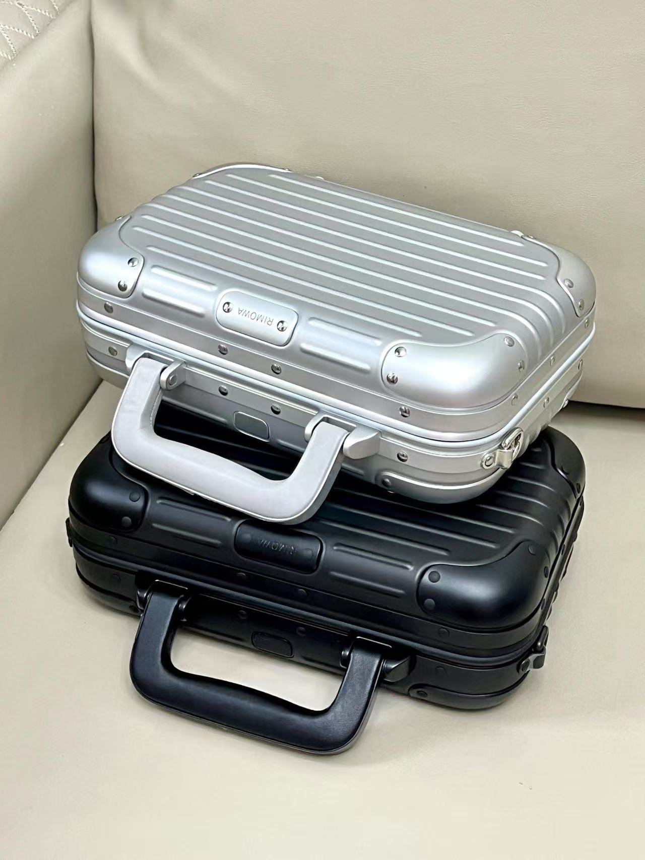 RIMOWA hand-held crossbody suitcase