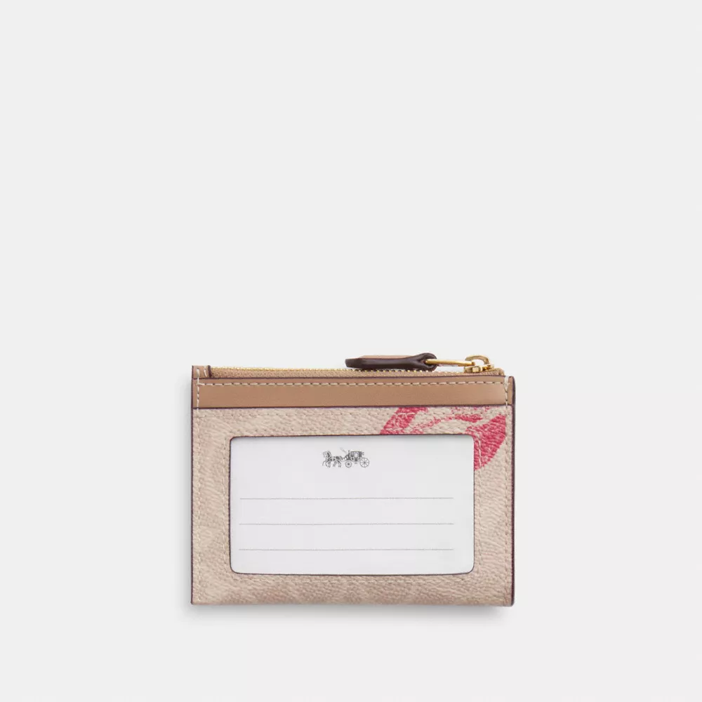 Mini Id Skinny Case In Signature Canvas With Lips Print