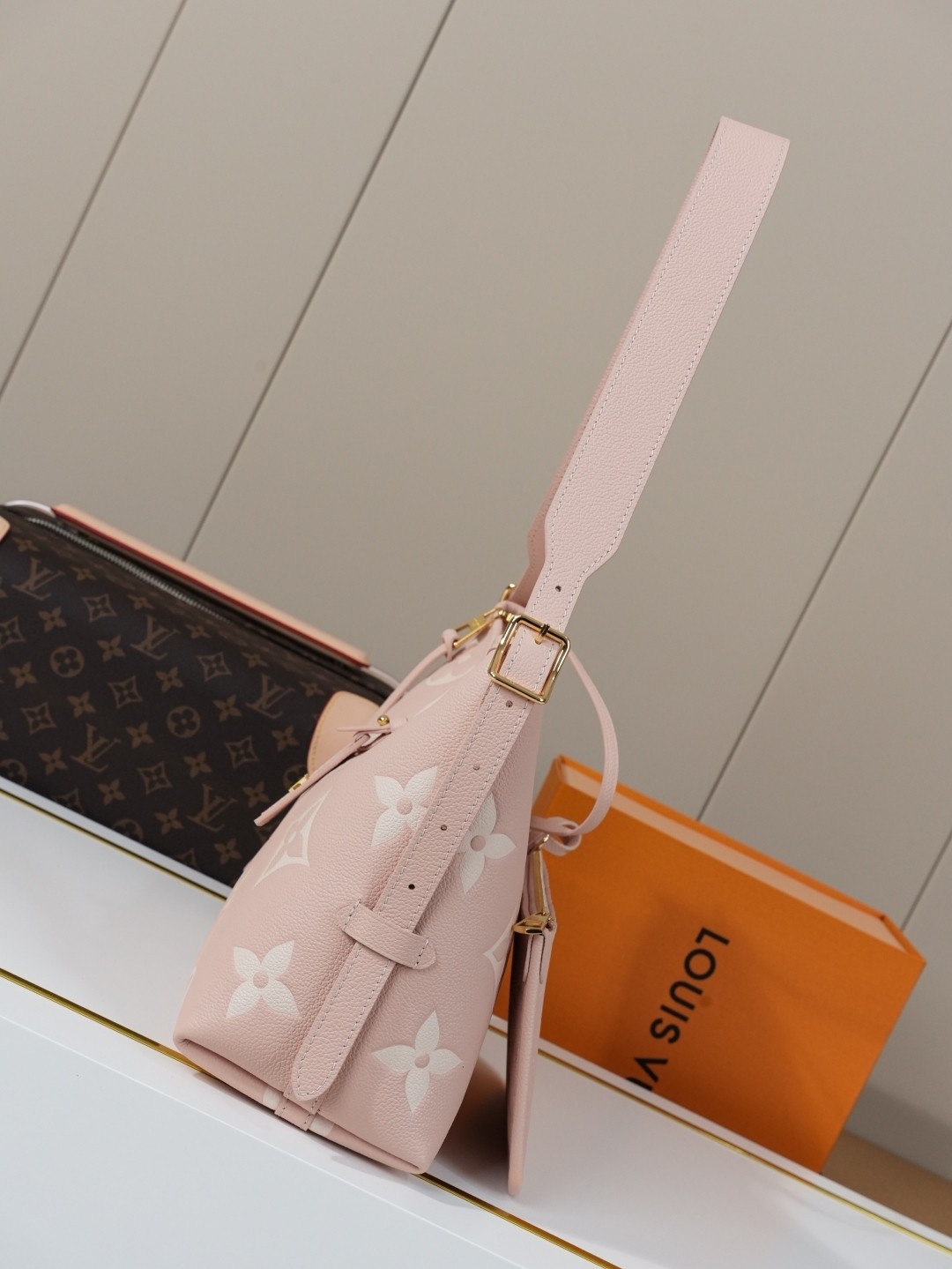 LV CarryAll Monogram Emeinte Milky Way handbag