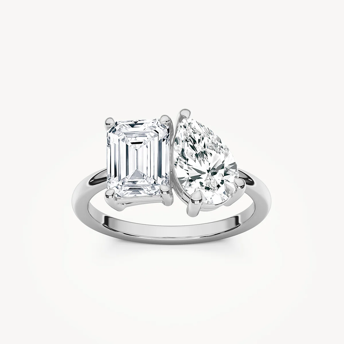 Fleur 2 ½ ctw Emerald and Pear Lab Grown Diamond Toi et Moi Engagement Ring