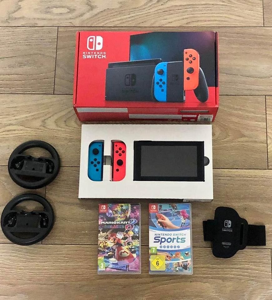 Nintendo Switch with Neon Blue and Neon Red Joy Con –