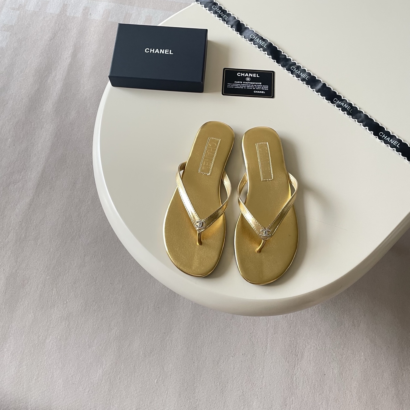 Chanel Embellished Logo Flip-Flops - Silver & Gold