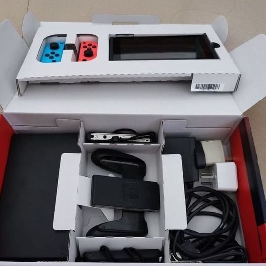 Nintendo Switch with Neon Blue and Neon Red Joy Con –