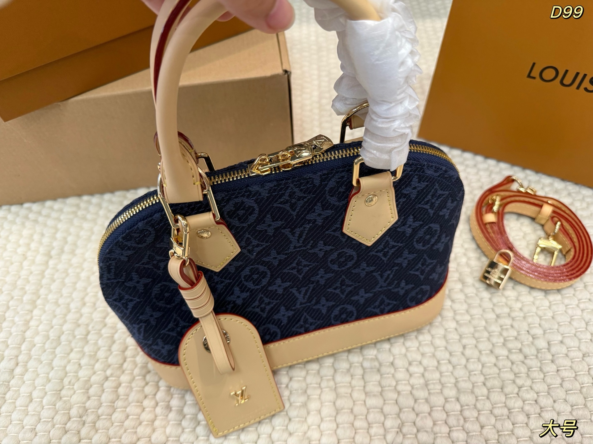 LV Alma BB Monogram Emblème Embroidered Shell Handbag