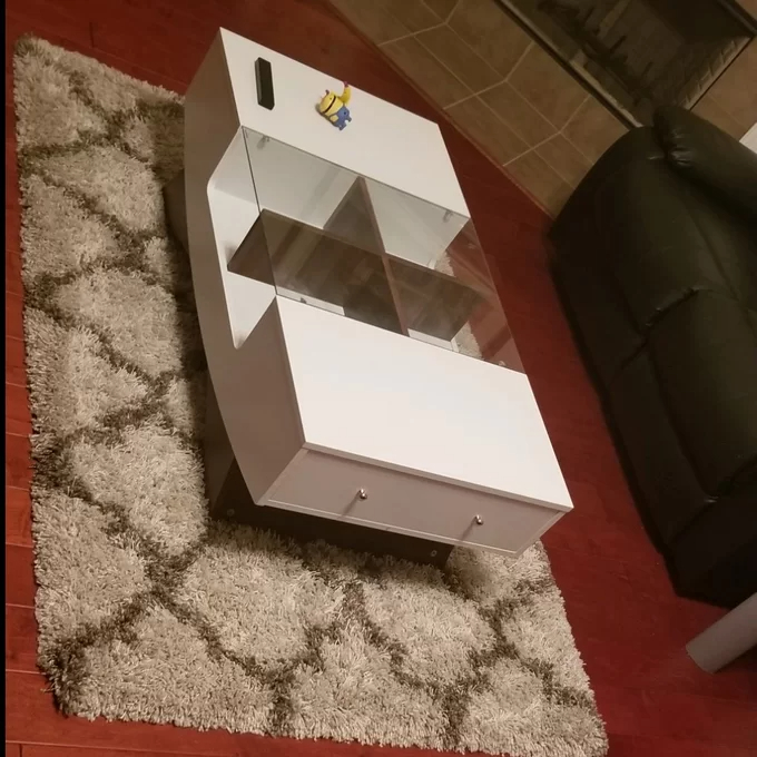 Madilynn Trestle Coffee Table with Storage