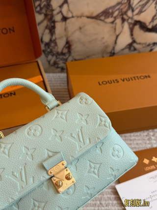 Nano Madeleine Handbag In Monogram Empreinte Leather