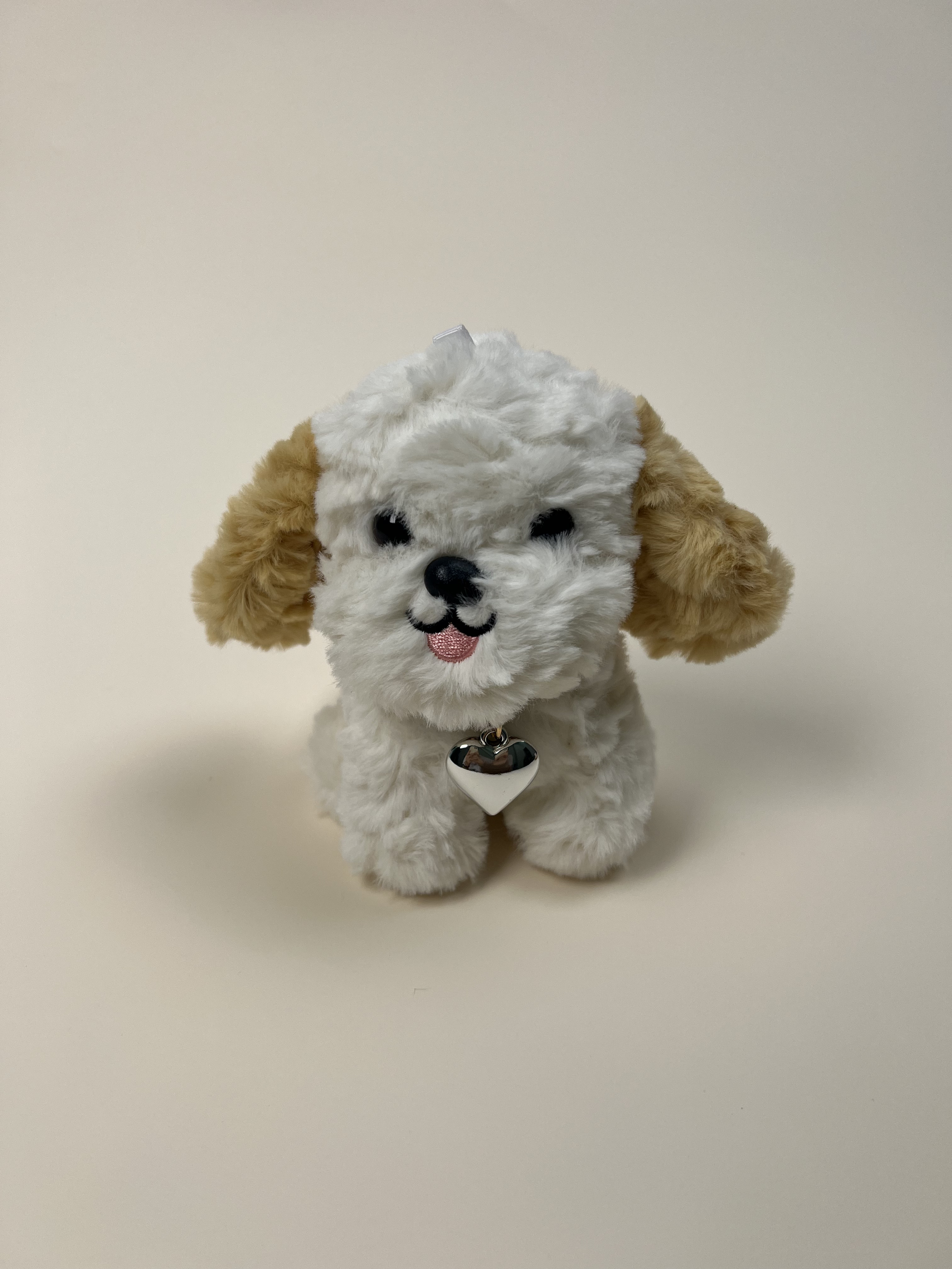 “Love” Tag Plush Toy: Tongue-Sticking-Out Curly-Haired Puppy