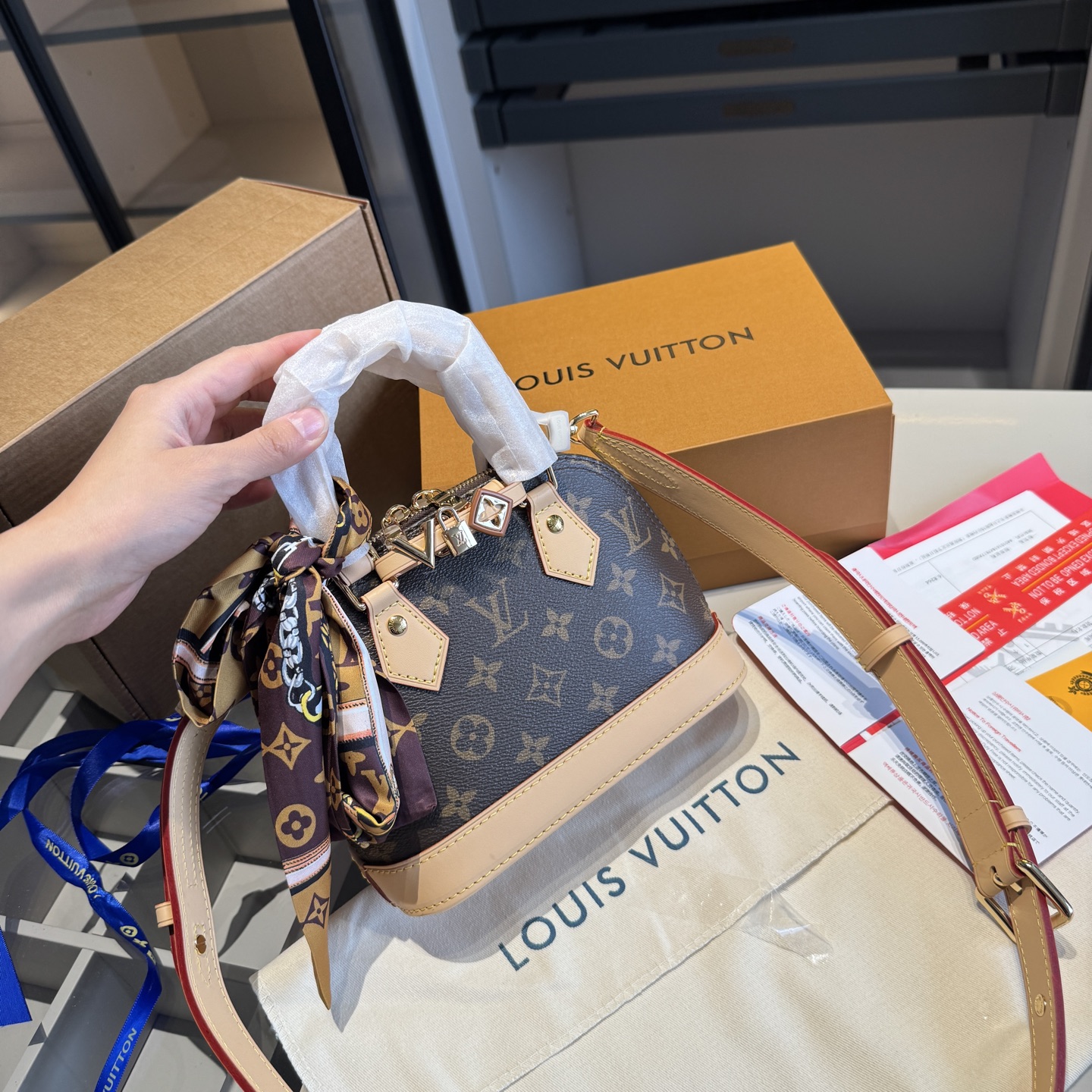 LV ALMA Shell Bag