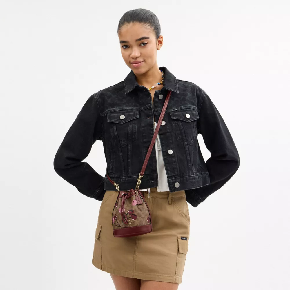 Mini Bucket Bag In Signature Canvas With Cherry Print