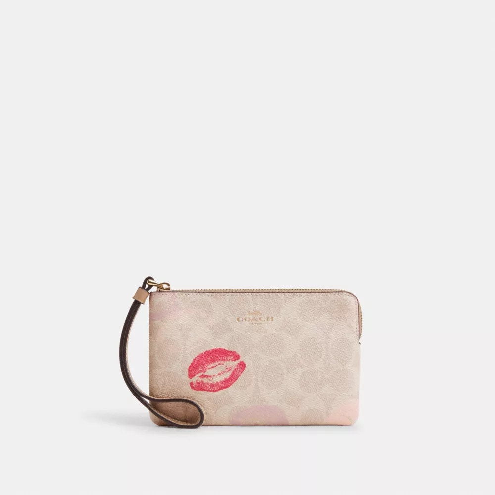 Corner Zip Wristlet In Signature Canvas With Lips Print