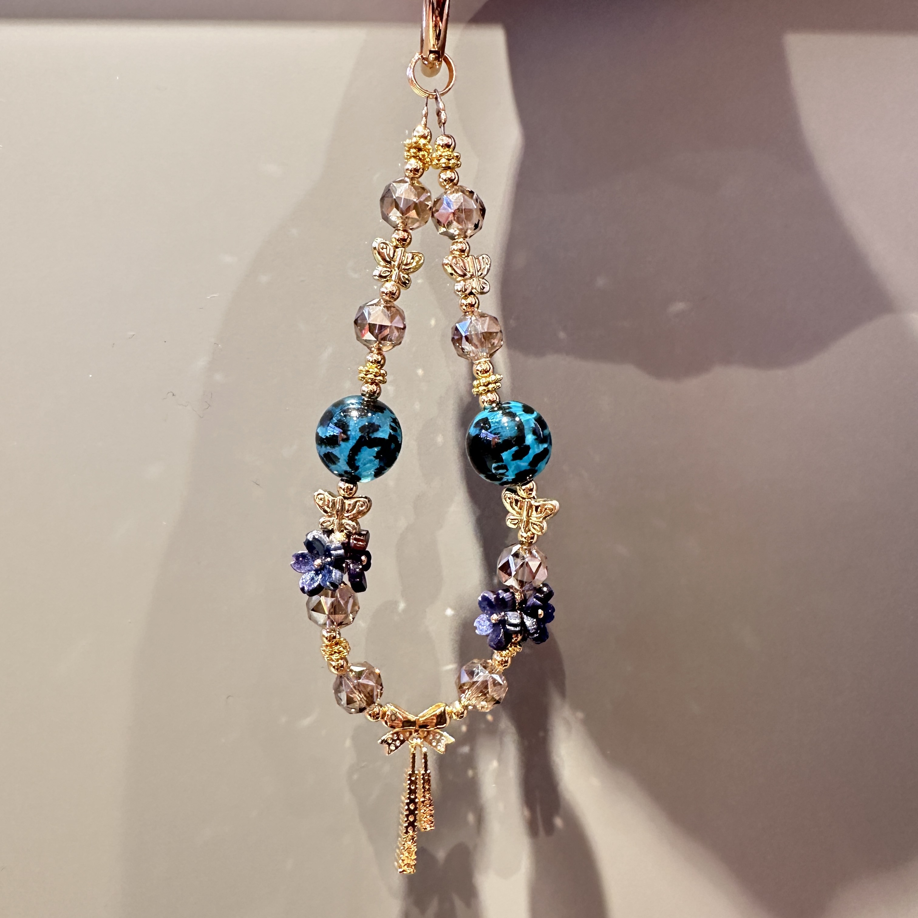 Elegant Blue Floral & Crystal Phone Charm