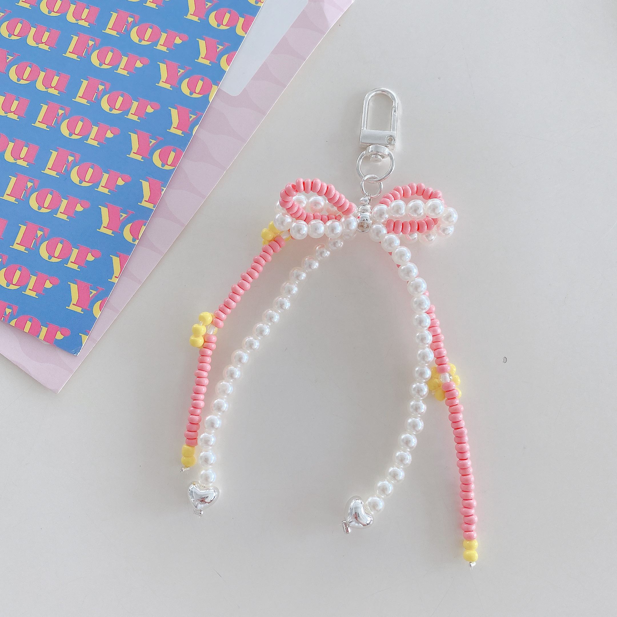 Playful Beaded Bow Phone Charms