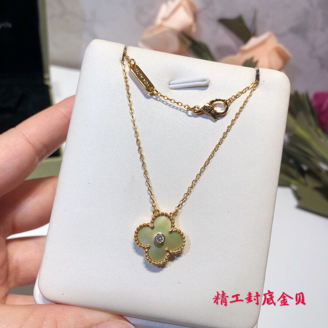 Luxury designer Kimshell necklace four-leaf clover 925 silver gold plated material car flower cross chain thick gold plated texture natural white shell texture color is different