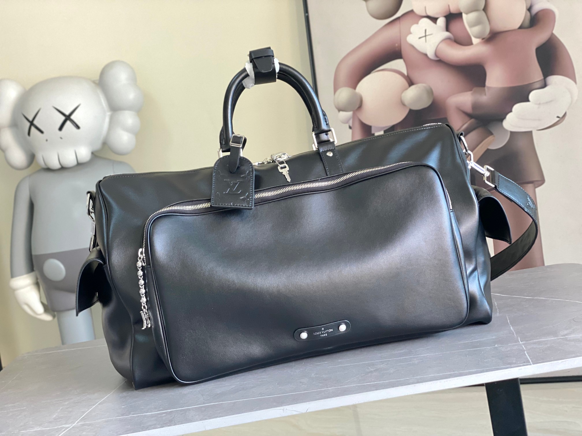 Luxury Designer Bag Fashion Bag Black Travel bag Cartoon pattern leather handle side with cartoon name brand can be customized