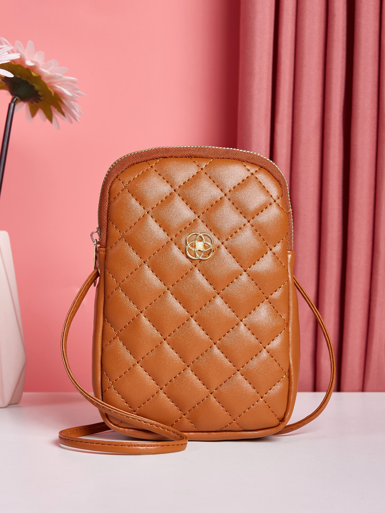 Minimalist quilted metal crossbody bag